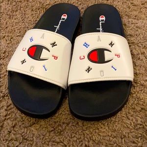 White and black Champion slides